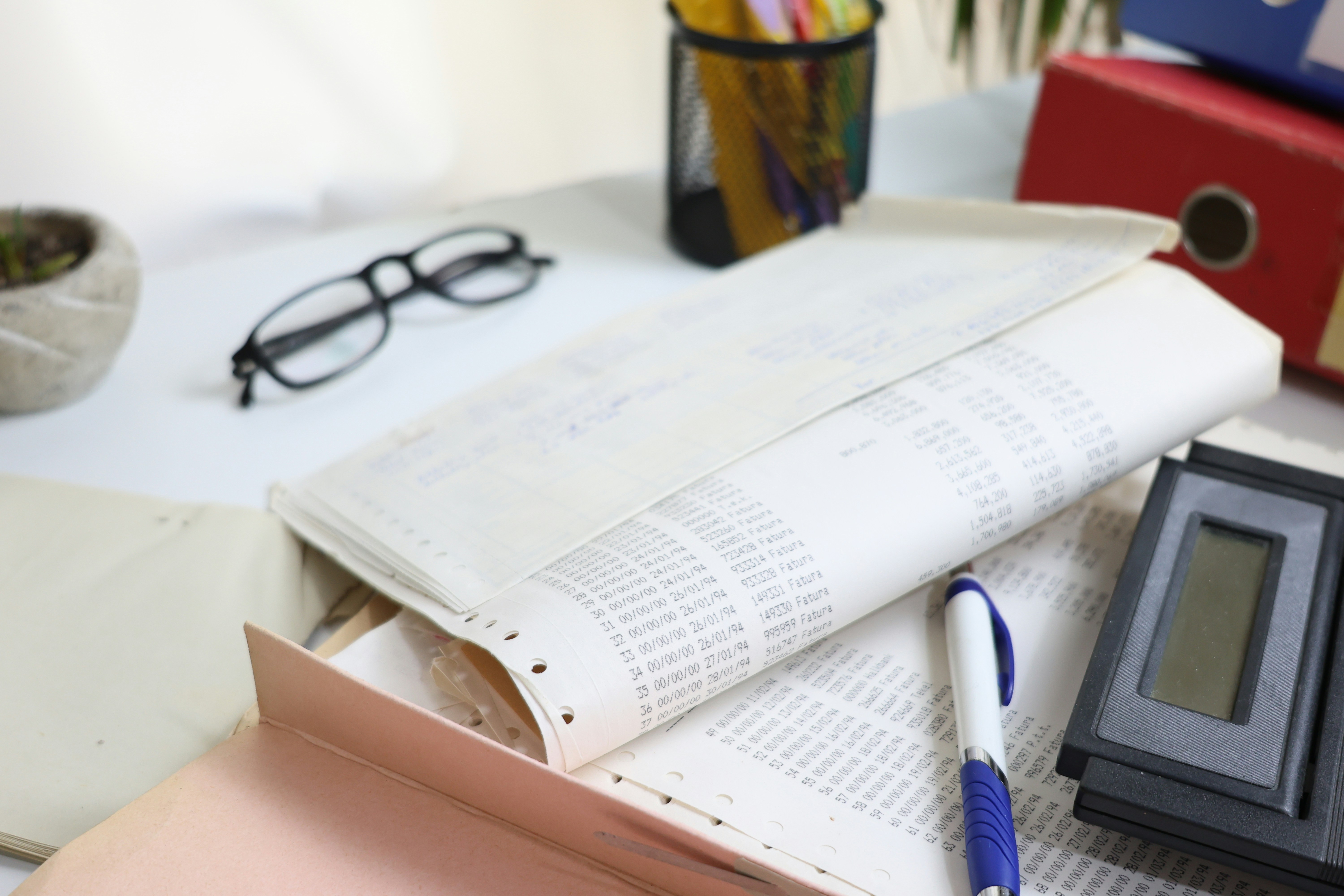 Financial report with a rising growth chart, calculator, and a 20-plus years badge